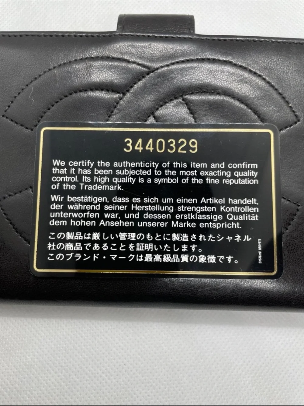 CHANEL Black Quilted Interlocking CC Leather Wallet - Picture 8 of 8